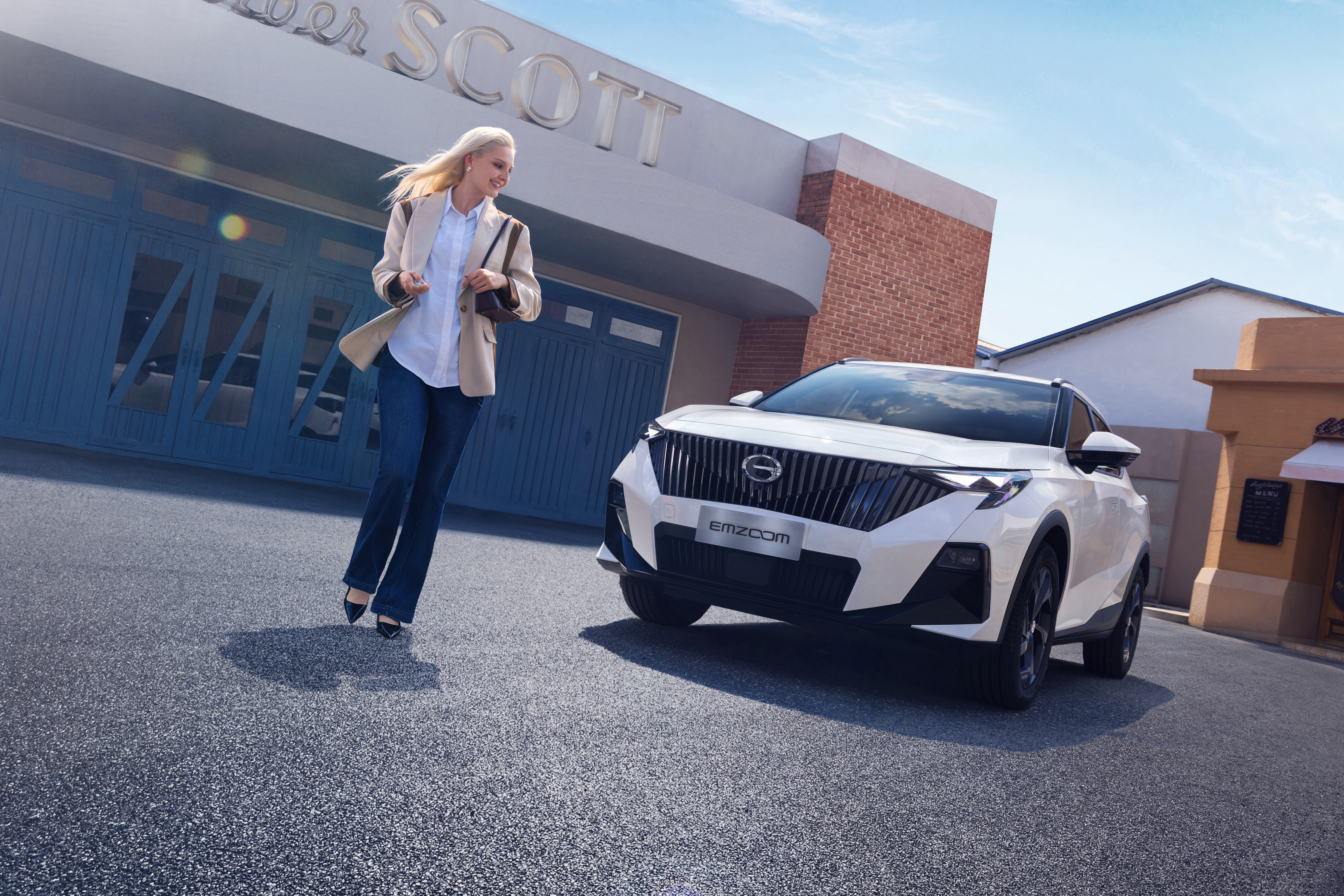 A woman walking around her car