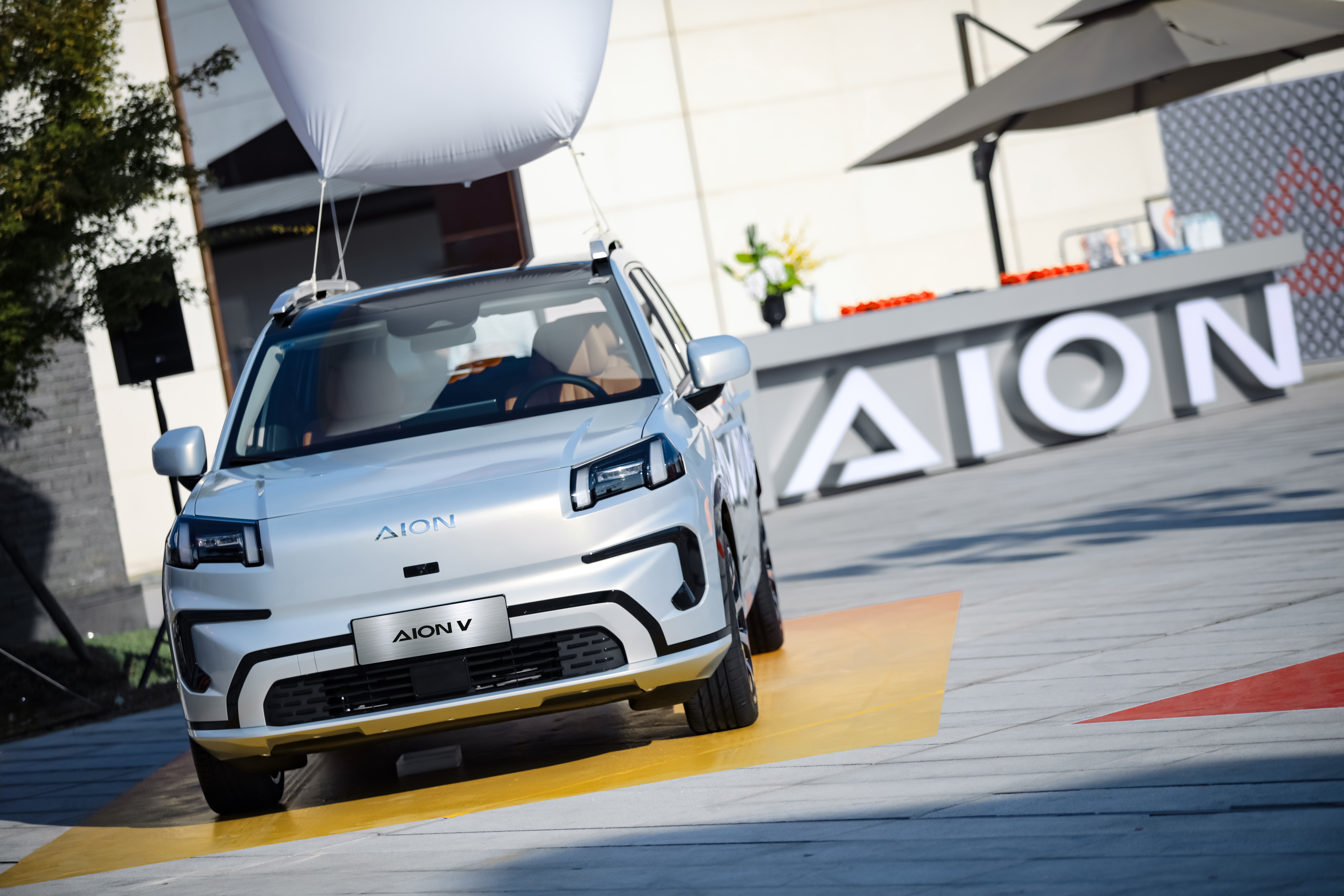 A GAC AION V parking on the stage